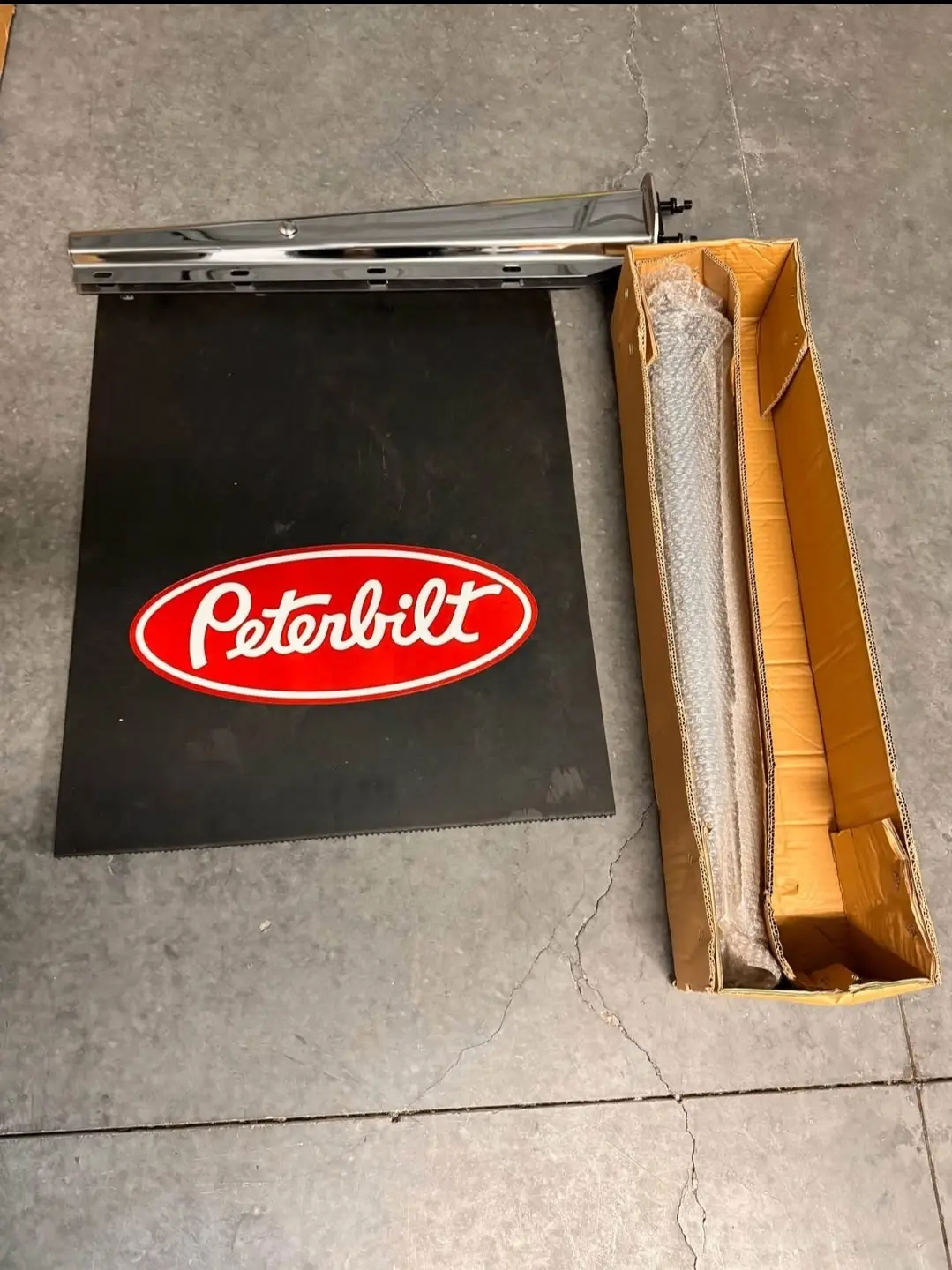Peterbilt mud flaps & SS polish hangers